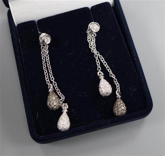 A pair of white metal two colour diamond set double drop earrings, approx. 58mm.